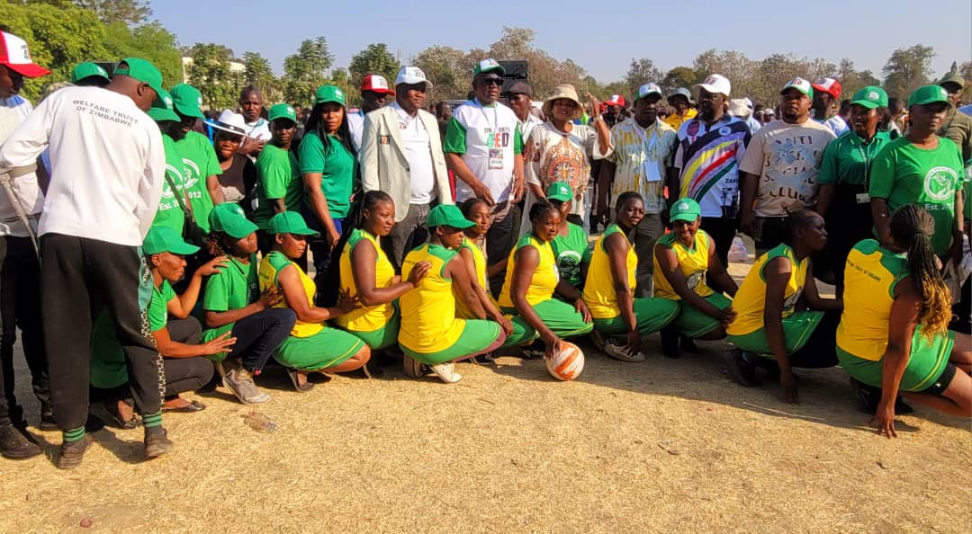 Netball team with officials at sports day